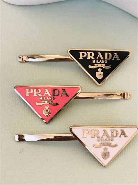 prada paperclip farfetch|Prada hair accessories.